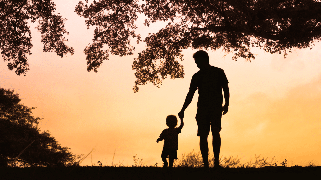 adopted son and father playing together